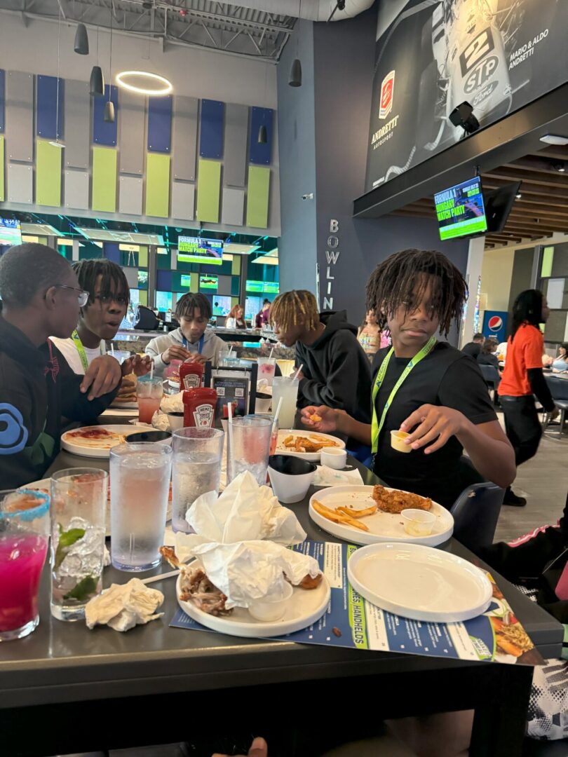 People enjoying a meal together in a casual restaurant setting.